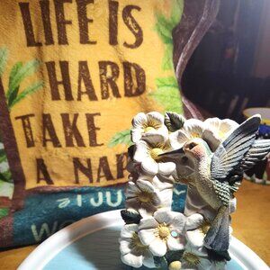 ****SOLD**** ceramic hummingbird and floral light switch cover.